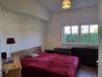 Schlafzimmer - vermietete 2-Zimmer- Erdgeschosswohnung in der Nähe der Ammer mit TG-Stellplatz