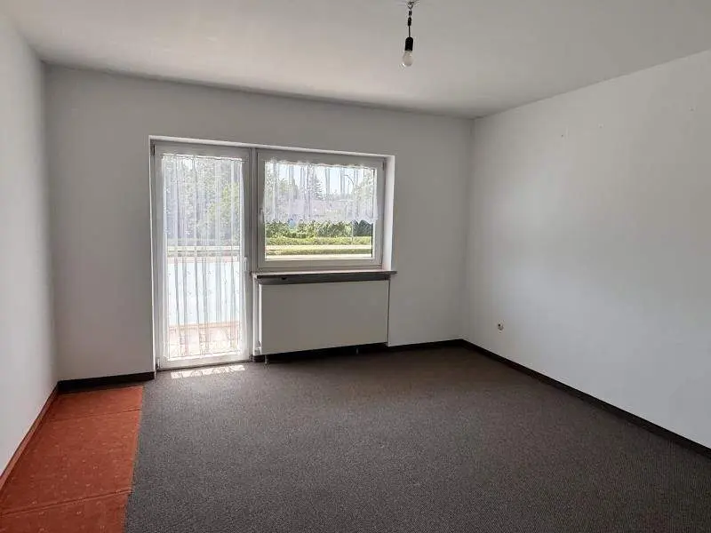 Schlafzimmer mit Balkonausgang